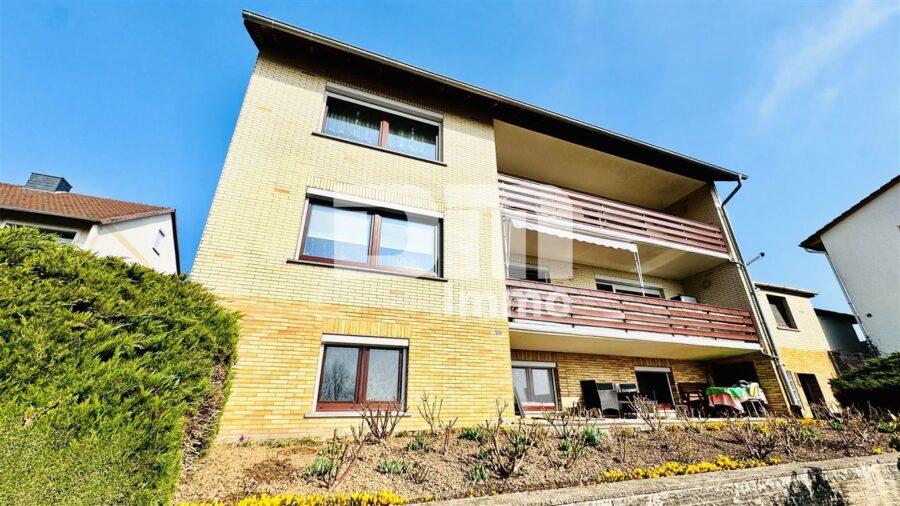 Modernisiertes Ein-/ Zweifamilienhaus inkl. PV-Anlage + Garage auf Traumgrundstück - Rückansicht